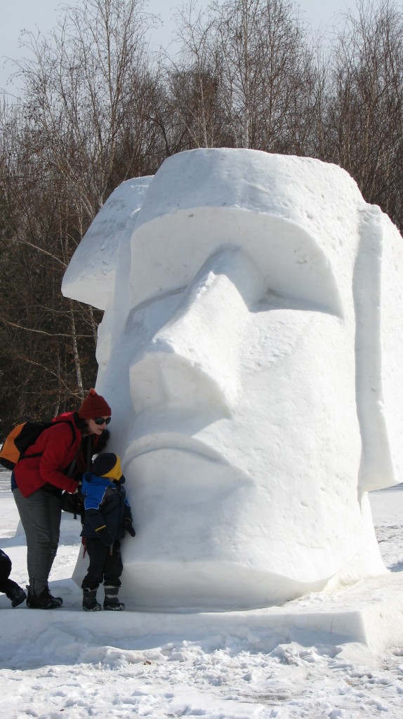 Bub 1 smooching a snow sculpture.
