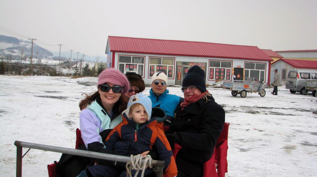 With the grandparents in a sleigh near the Chinese northern city of Harbin
