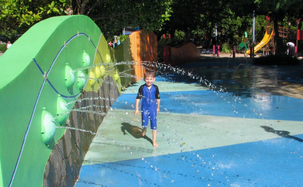 Water play at Muddies Playground Cairns