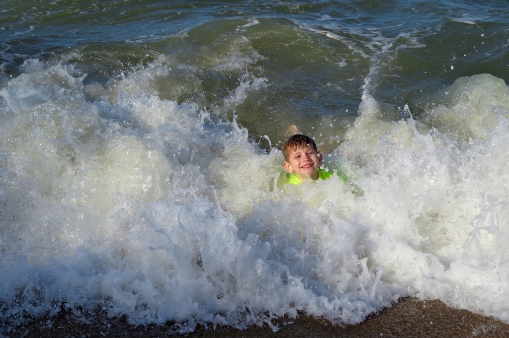 In the surf at Trinity Beach