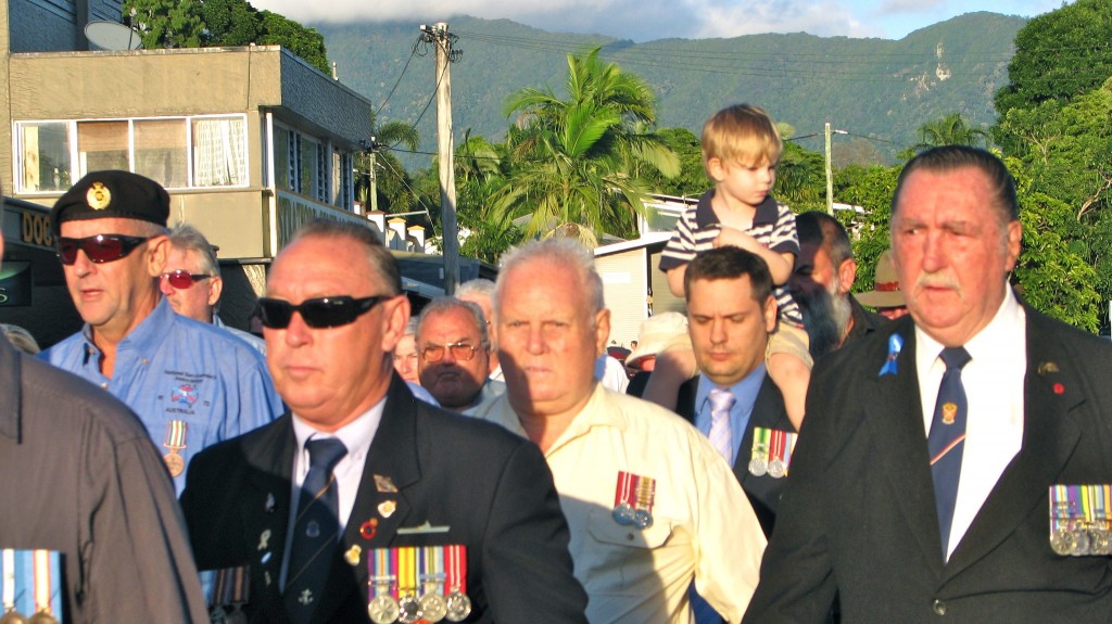 Anzac Day.  My husband carrying my younger son in an Anzac Day march a few years ago.