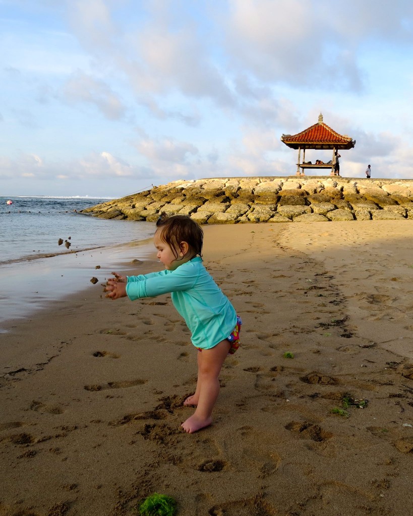 Wearing a rashy at the beach (and doing a bit of beach yoga for fun)