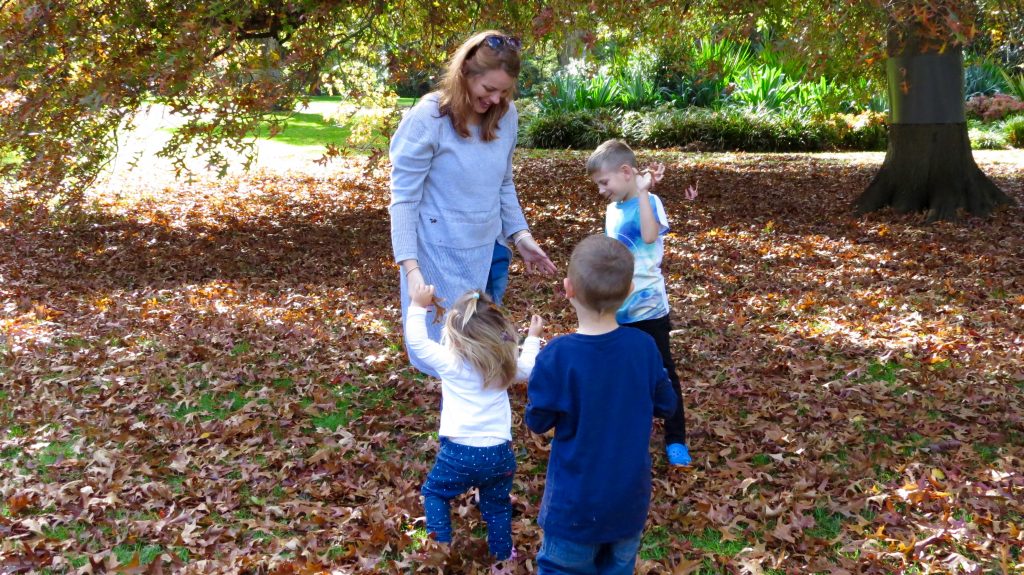 The kids ganged up on me for a leaf fight at the Fitzroy Gardens