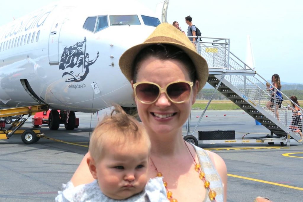 Those grumpy passengers have no idea why we are flying with our kids...